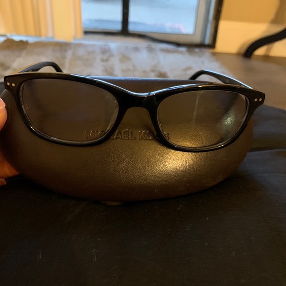 Michael Kors eyeglasses, cleansing cloth, and case
